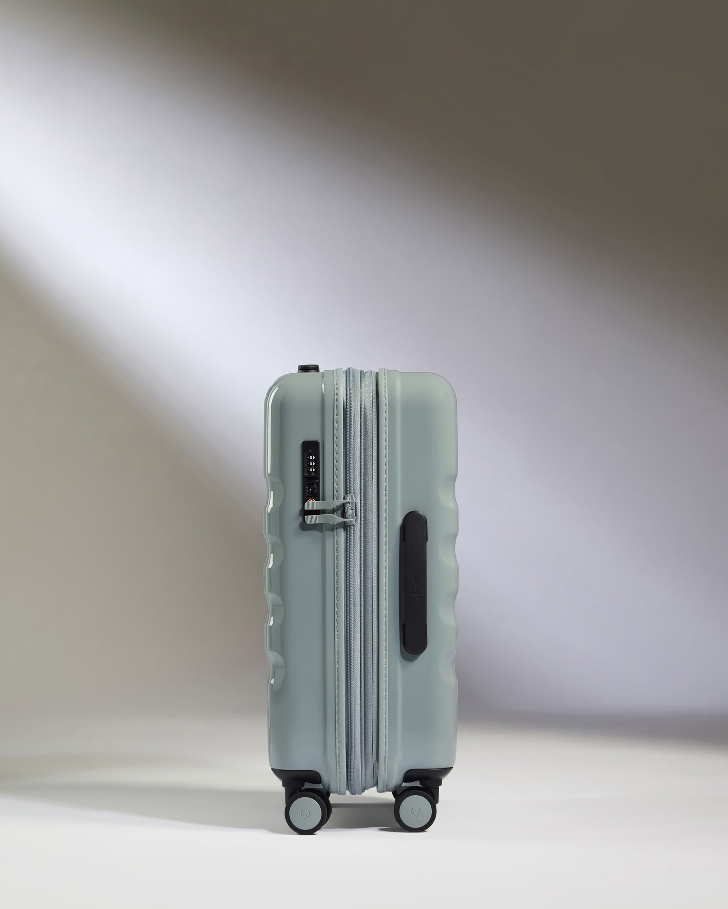 Expandable Carry-on Luggage in Mist Blue Gloss - Icon Stripe