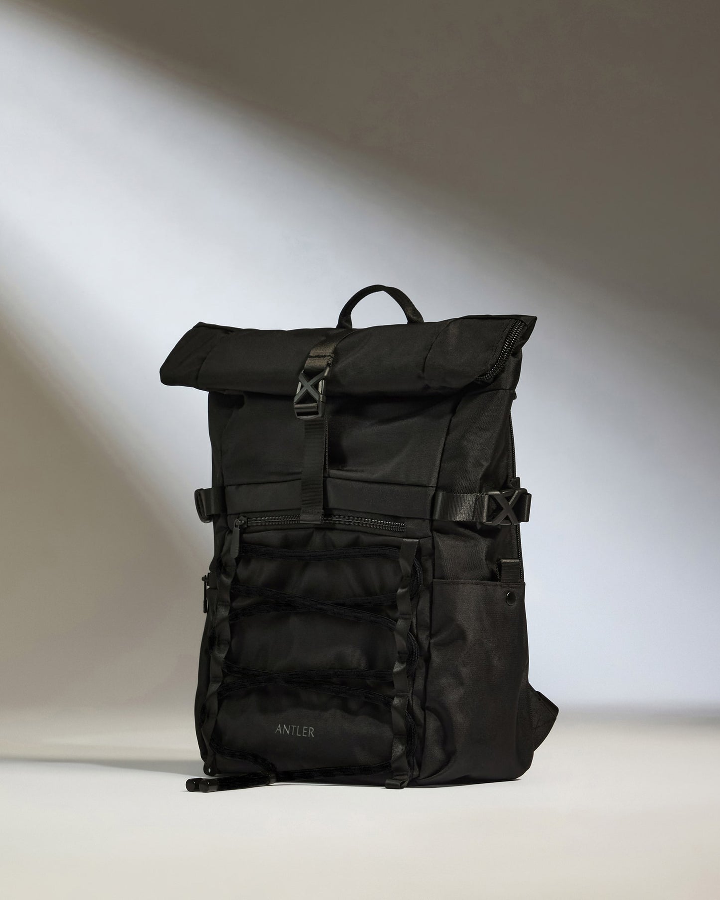 Discovery Roll Top Backpack in Black