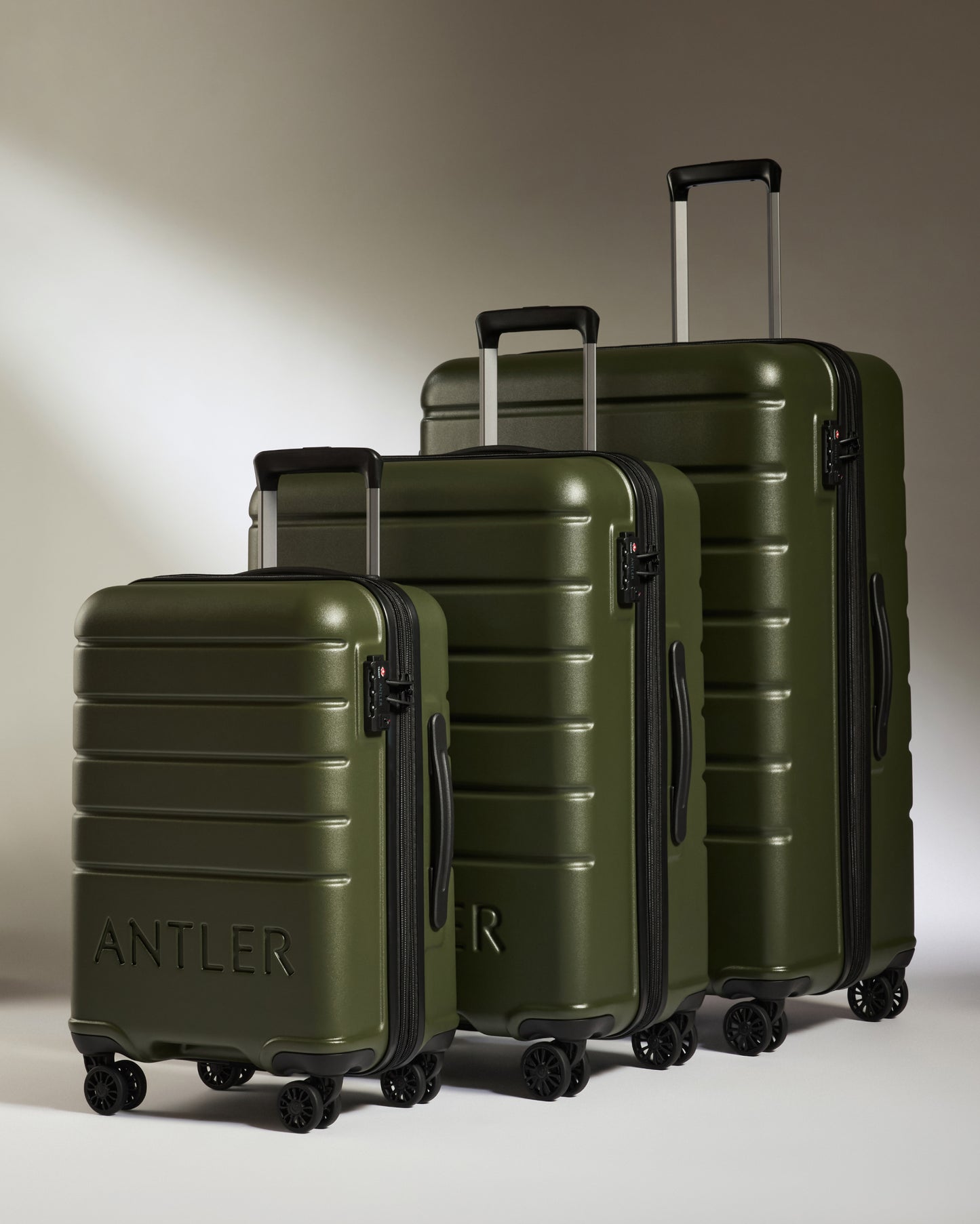 Expandable Carry-on Luggage Set in Pine - Logo