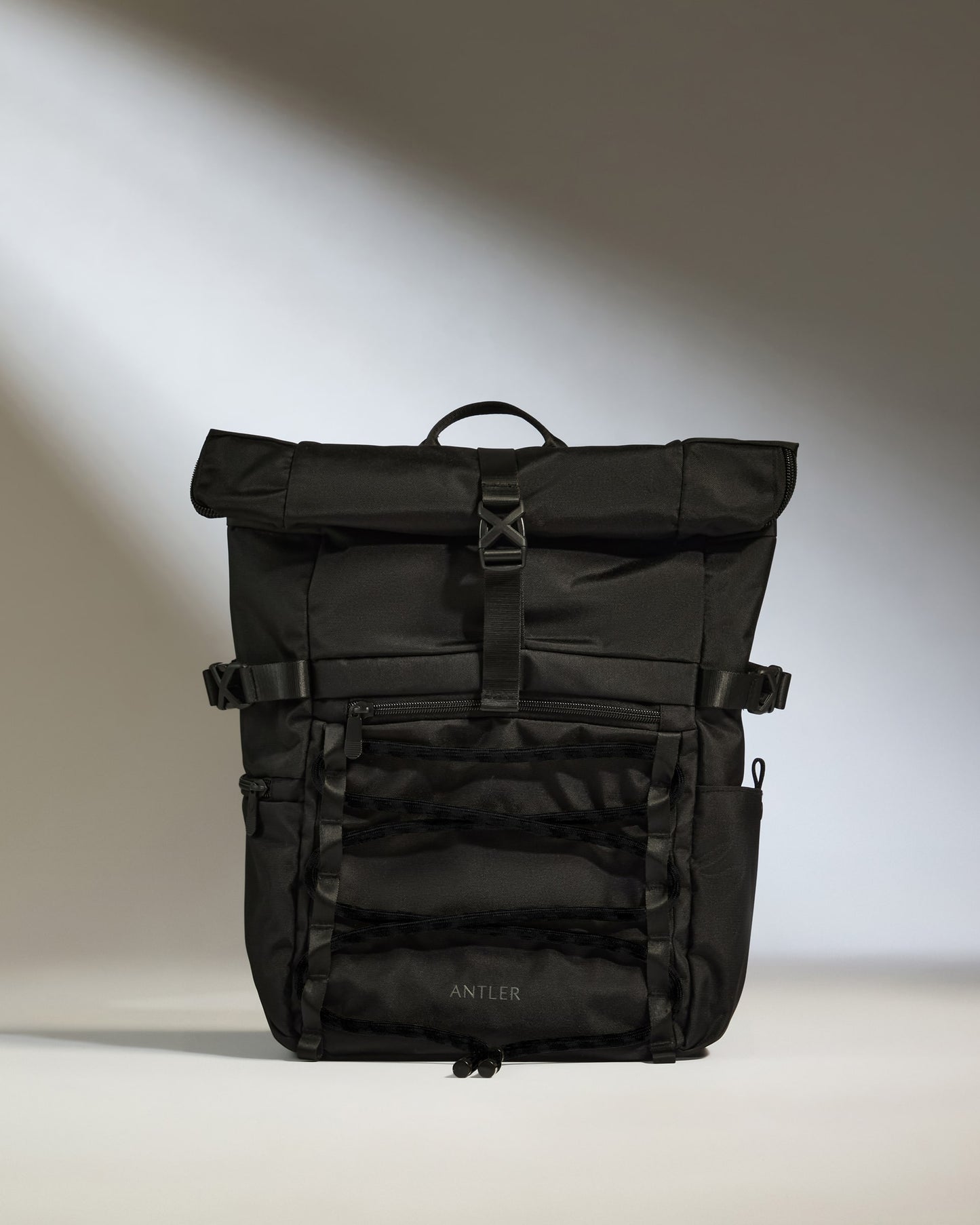 Discovery Roll Top Backpack in Black