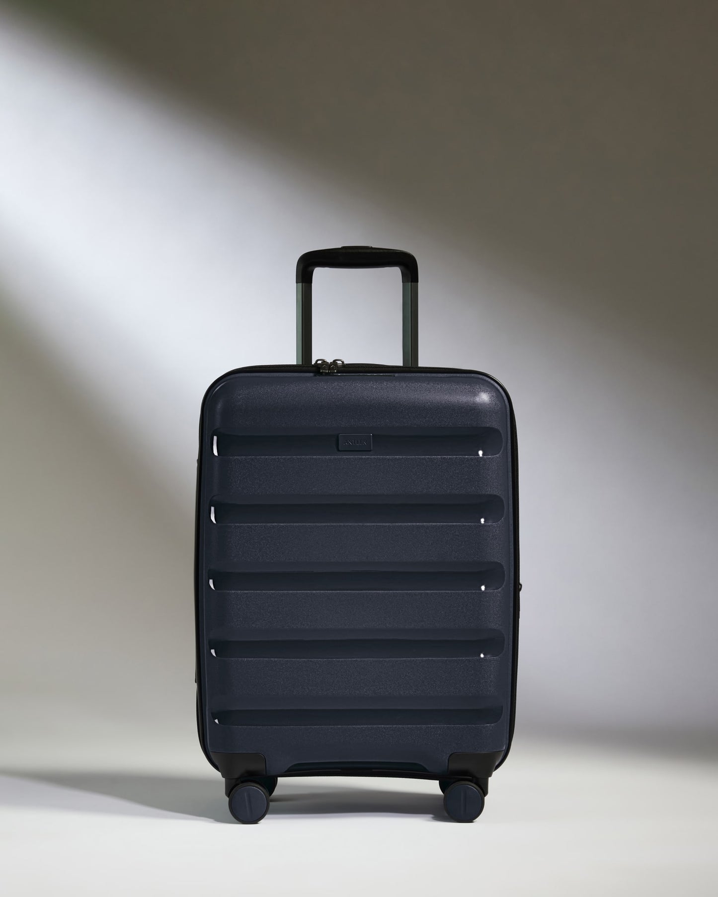 Expandable Carry-on Luggage in Navy - Logo Stripe