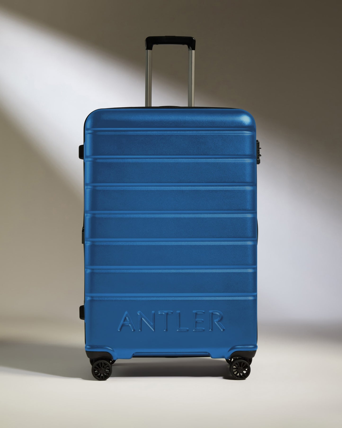 Large Luggage in Bold Blue - Logo