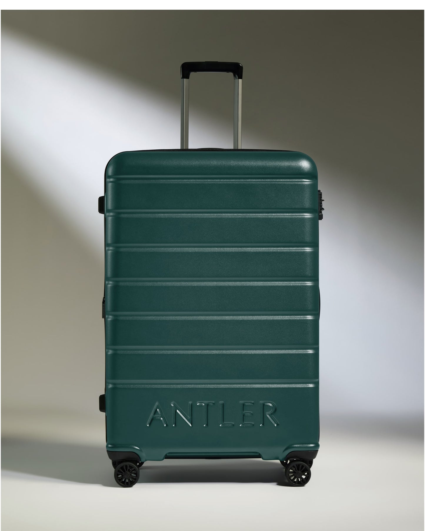 Large Luggage in Dark Teal - Logo