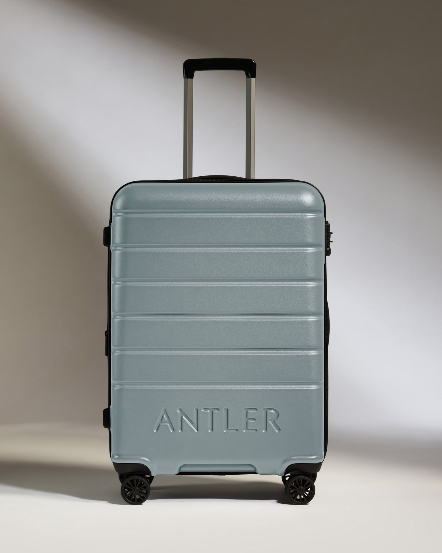 Medium Luggage in Cool Grey - Logo
