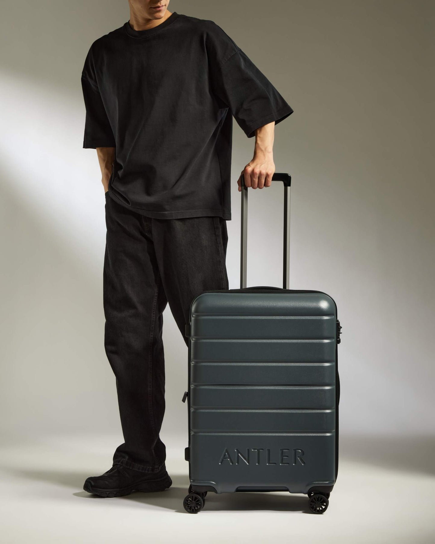 Medium Luggage in Granite Grey - Logo