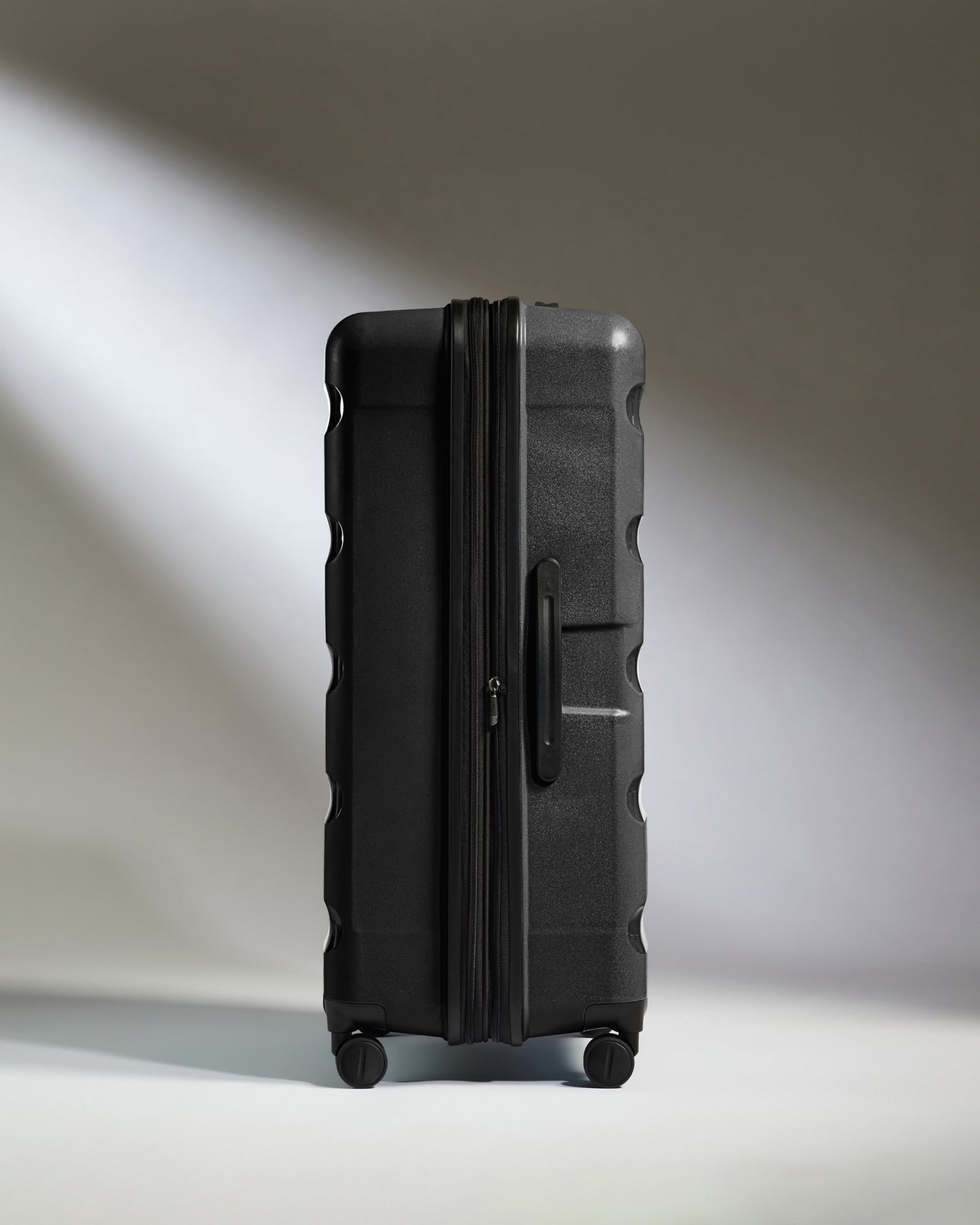 Large Luggage in Black - Logo Stripe