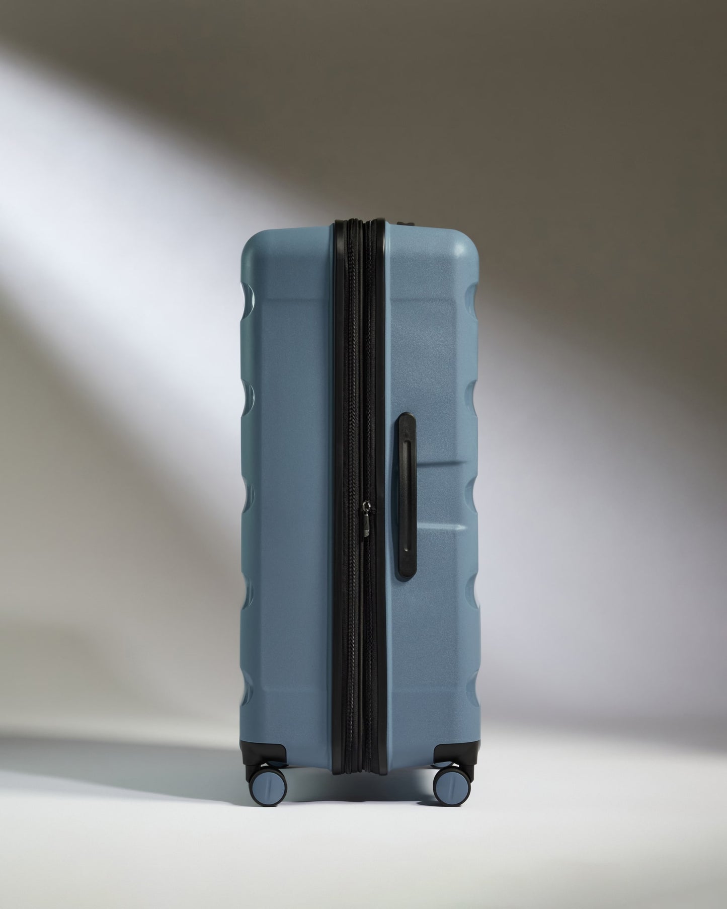 Large Luggage in Light Blue - Logo Stripe