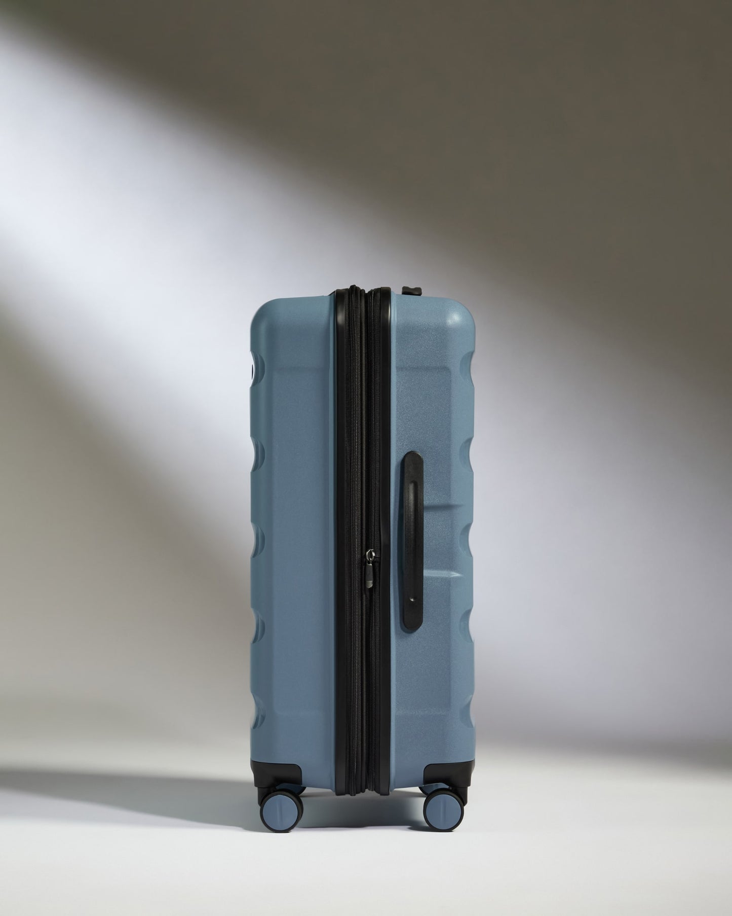 Medium Luggage in Light Blue - Logo Stripe