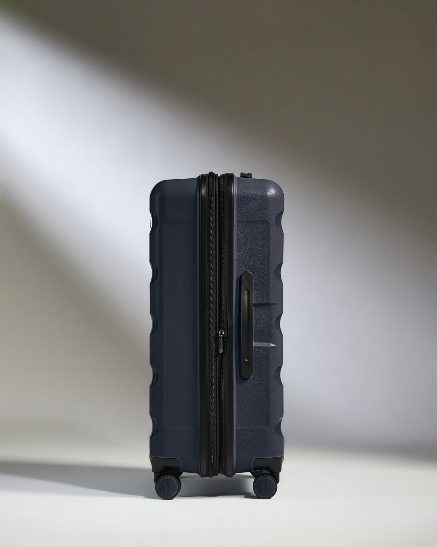 Medium Luggage in Navy - Logo Stripe