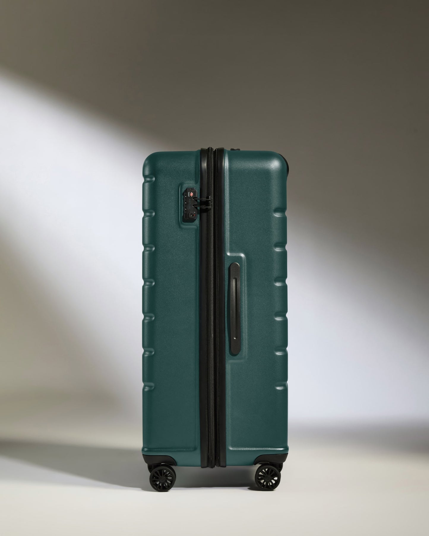 Large Luggage in Dark Teal - Logo