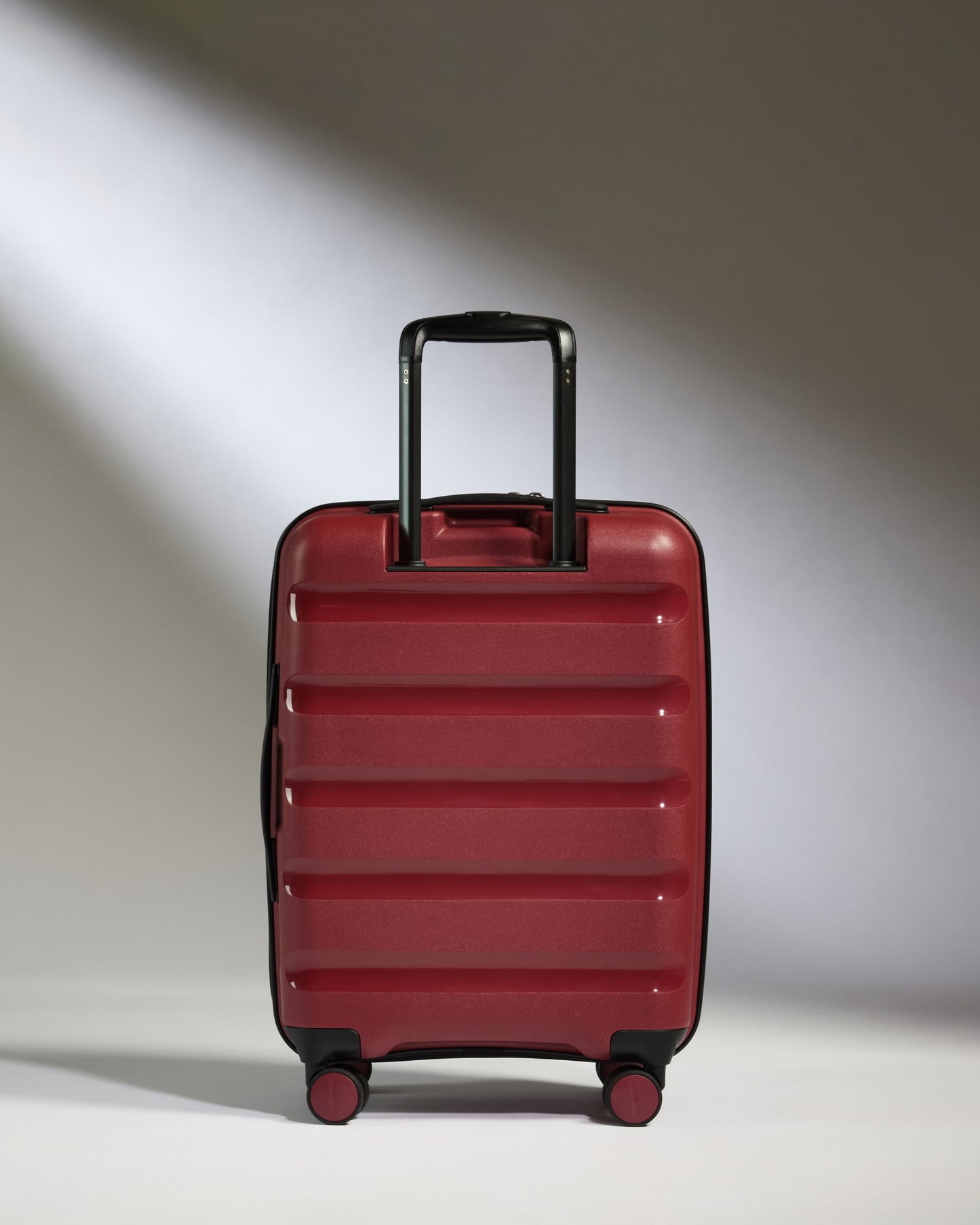 Expandable Carry-on Luggage in Soft Red - Logo Stripe