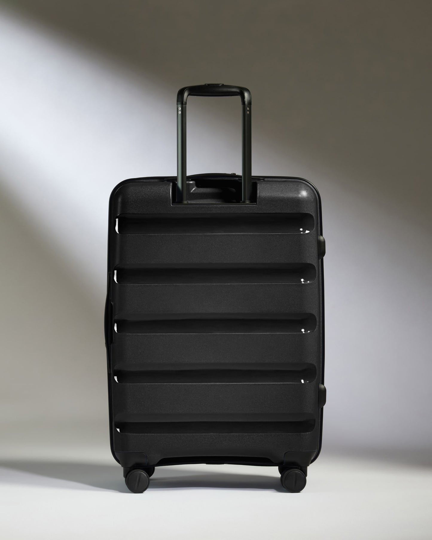 Medium Luggage in Black - Logo Stripe