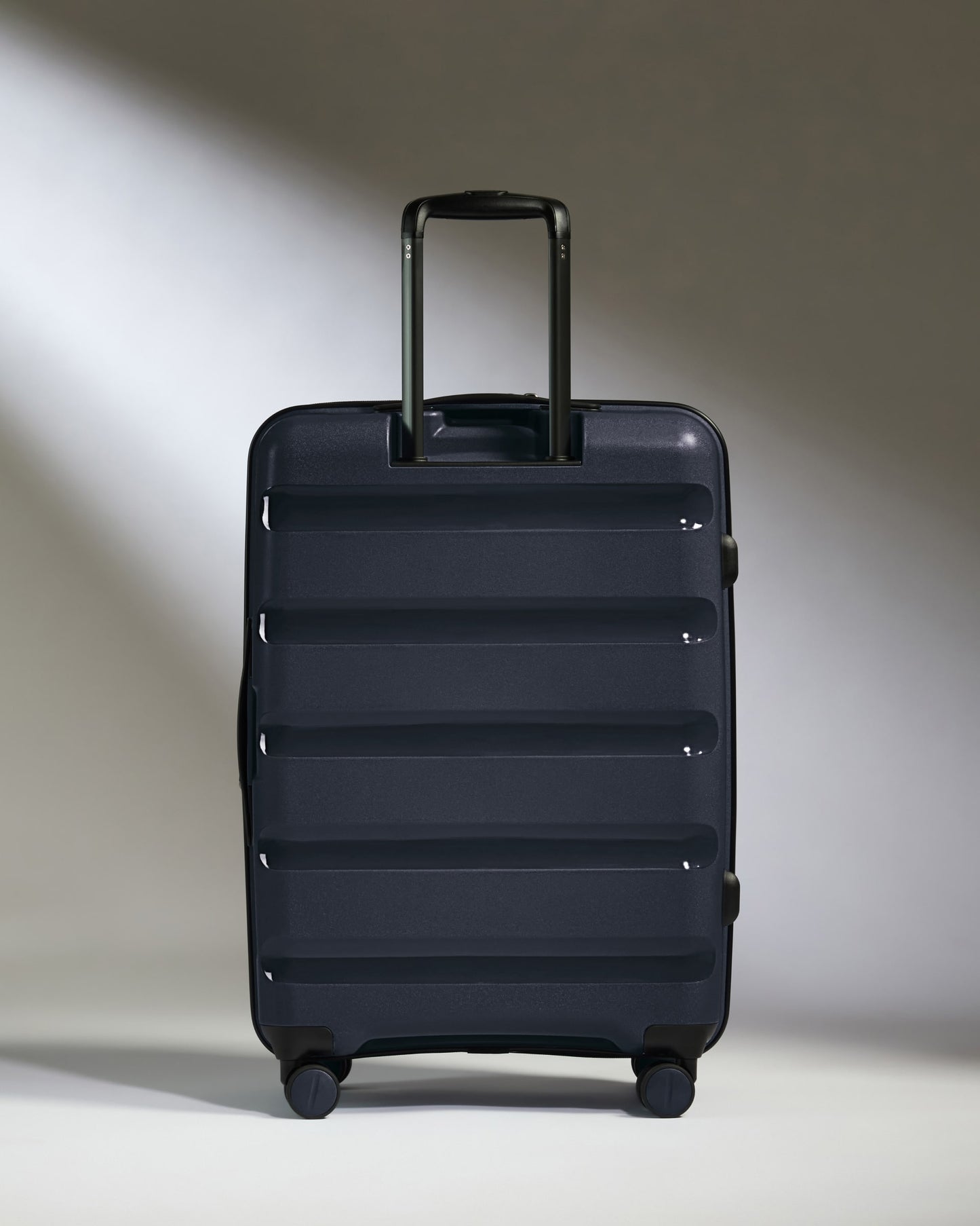 Medium Luggage in Navy - Logo Stripe