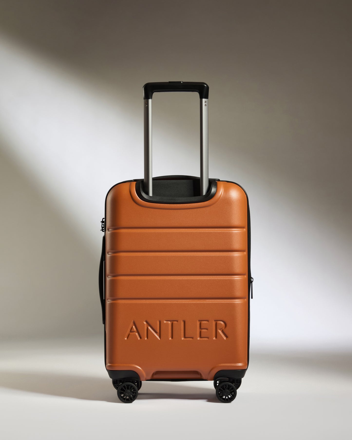Expandable Carry-on Luggage in Amber - Logo