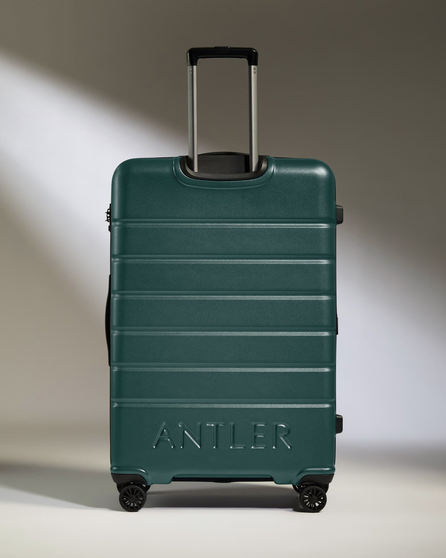 Large Luggage in Dark Teal - Logo