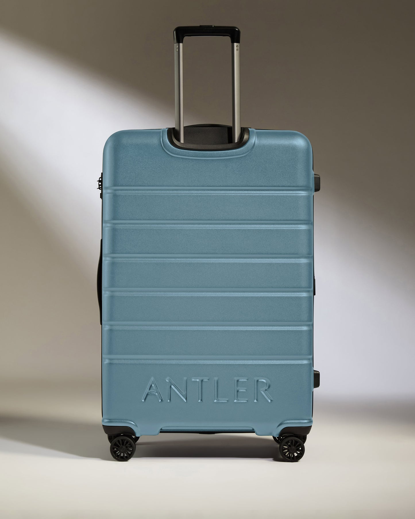 Large Luggage in Light Blue - Logo