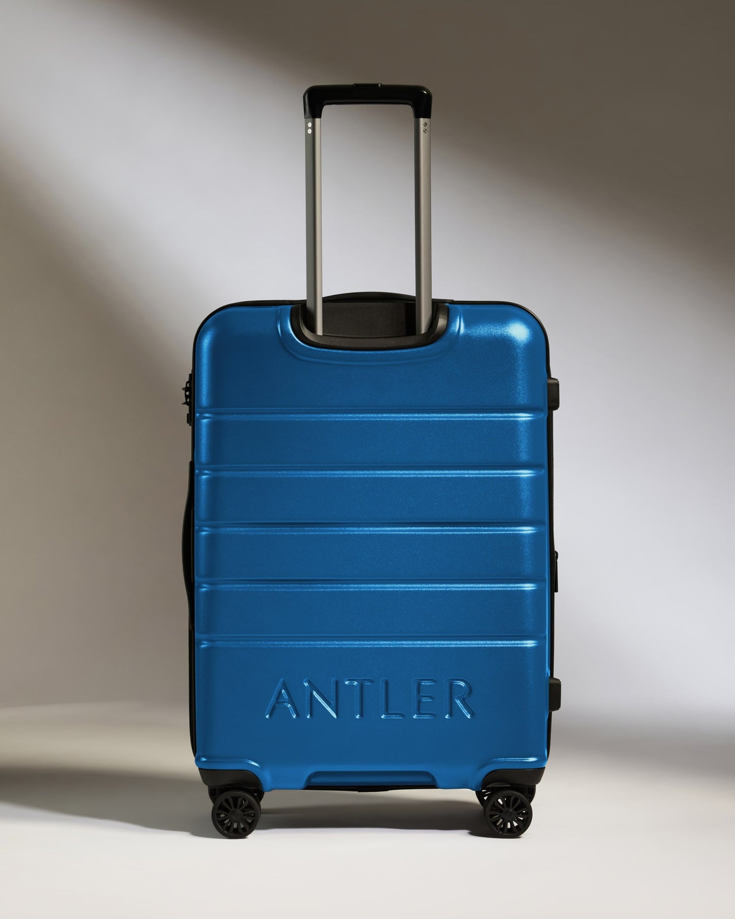 Medium Luggage in Bold Blue - Logo