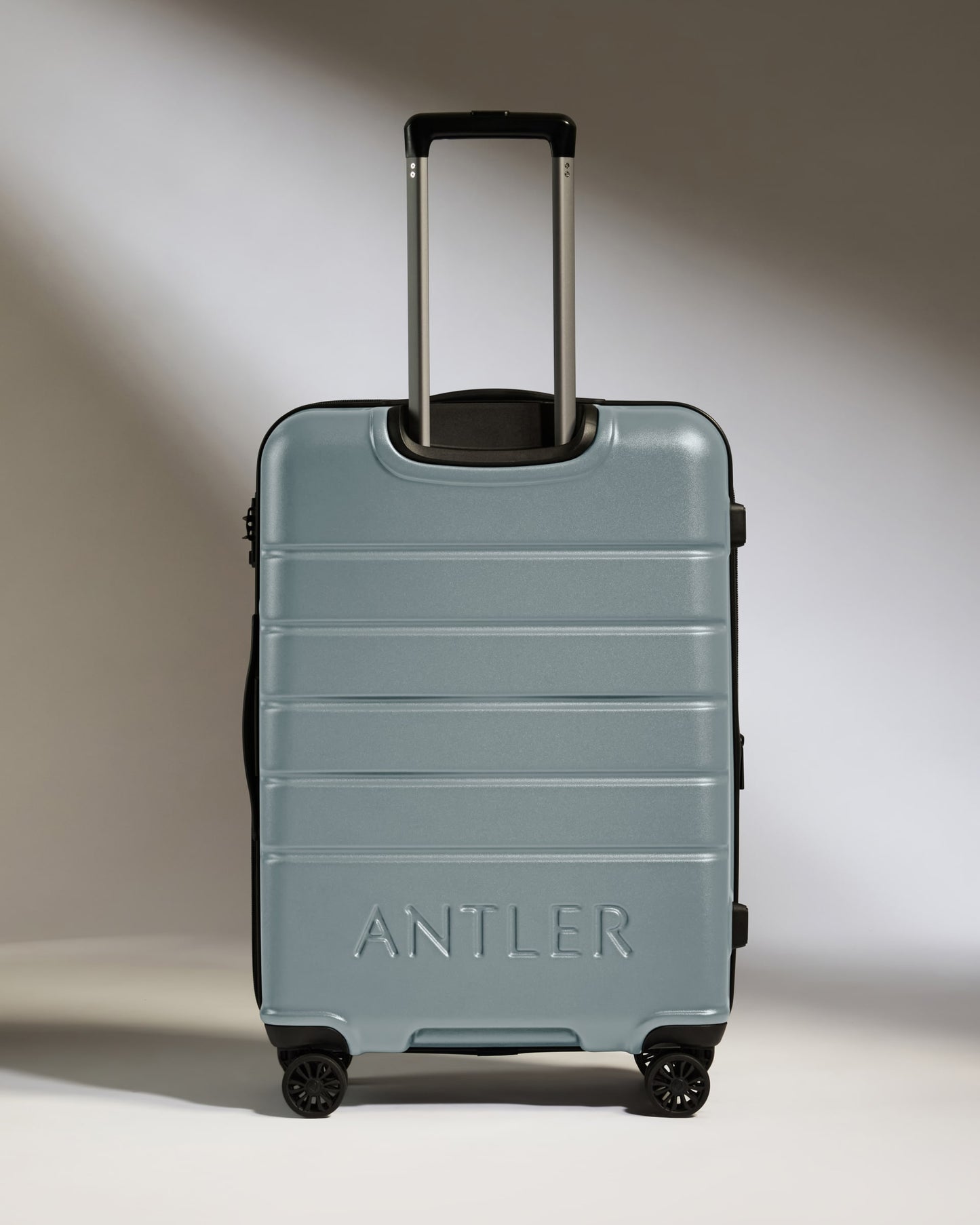 Medium Luggage in Cool Grey - Logo