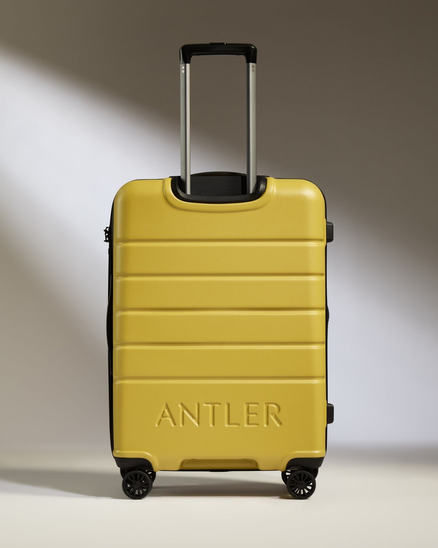 Medium Luggage in Mustard Yellow - Logo