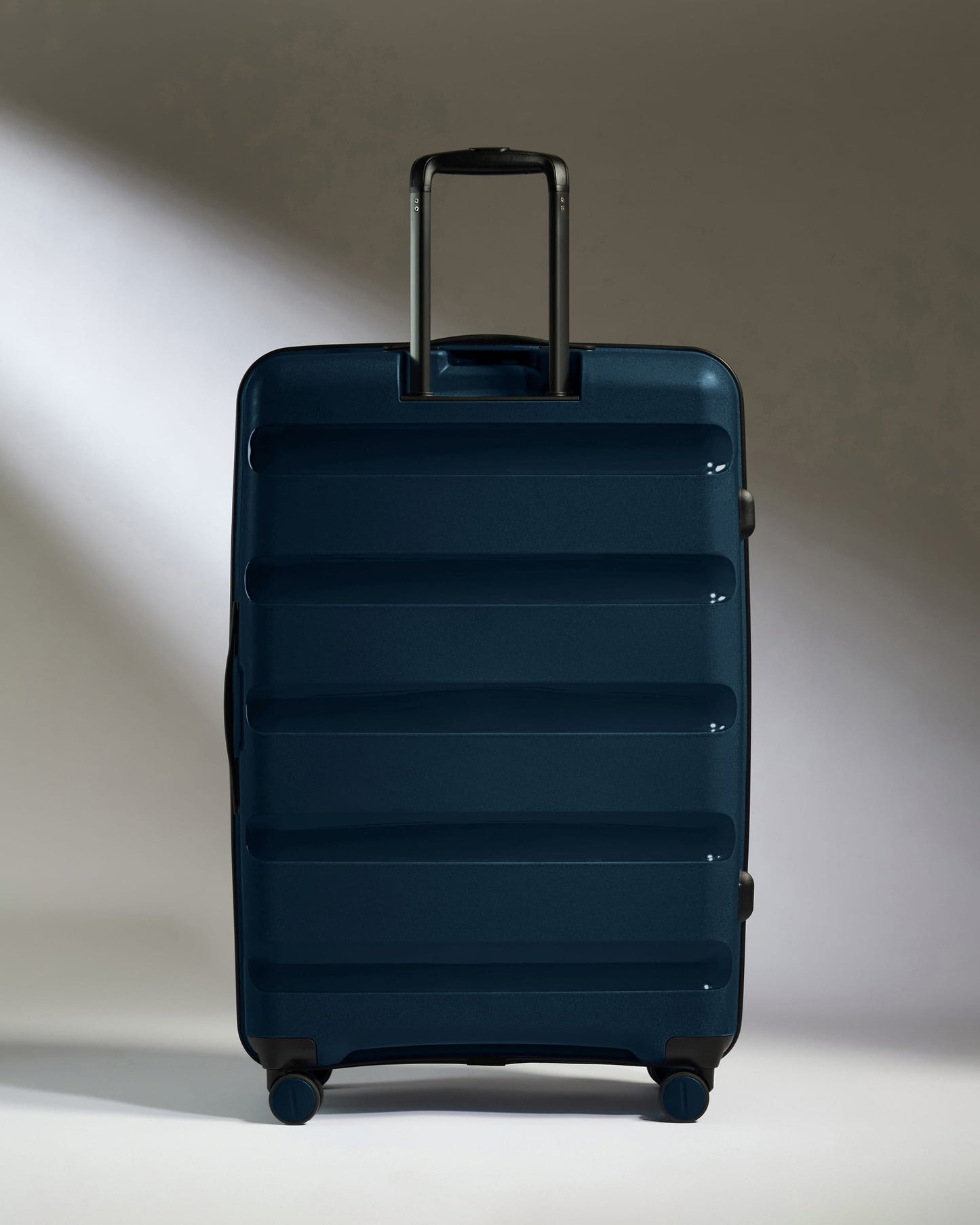 Large Luggage in Midnight Blue - Logo Stripe