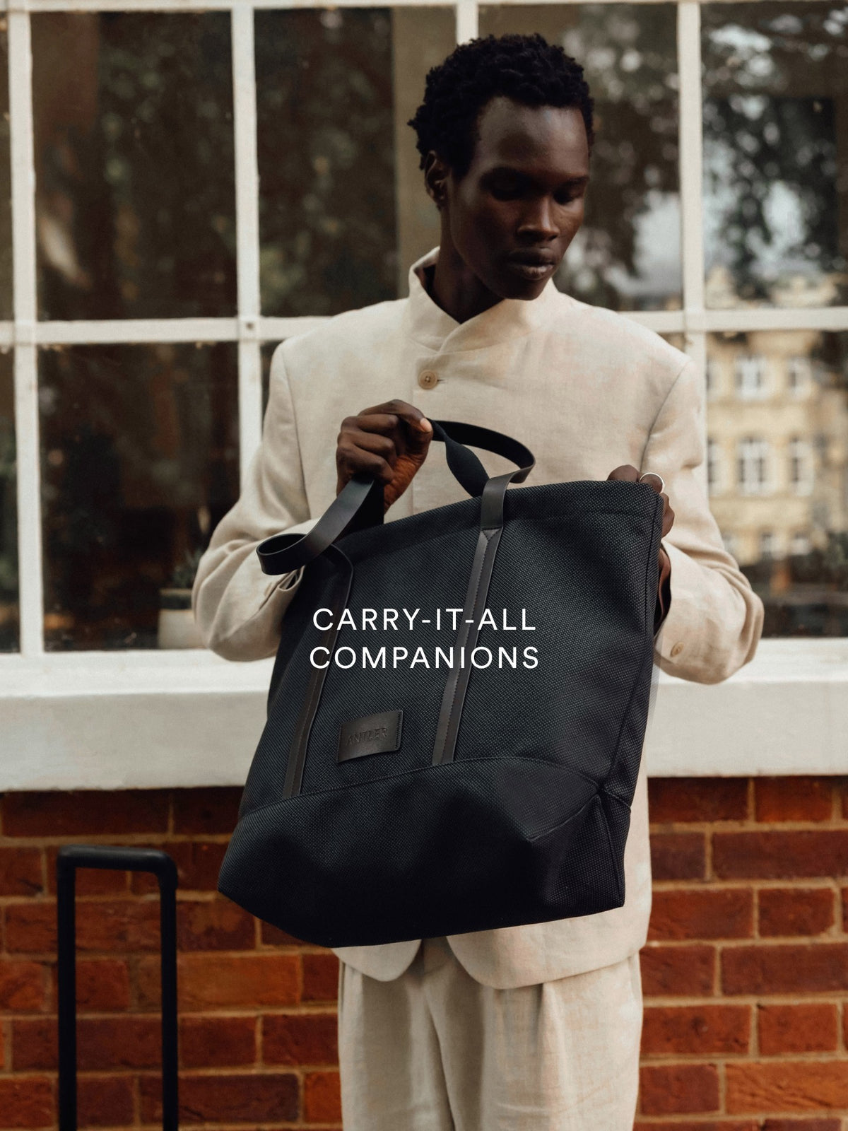 a man holding a bag