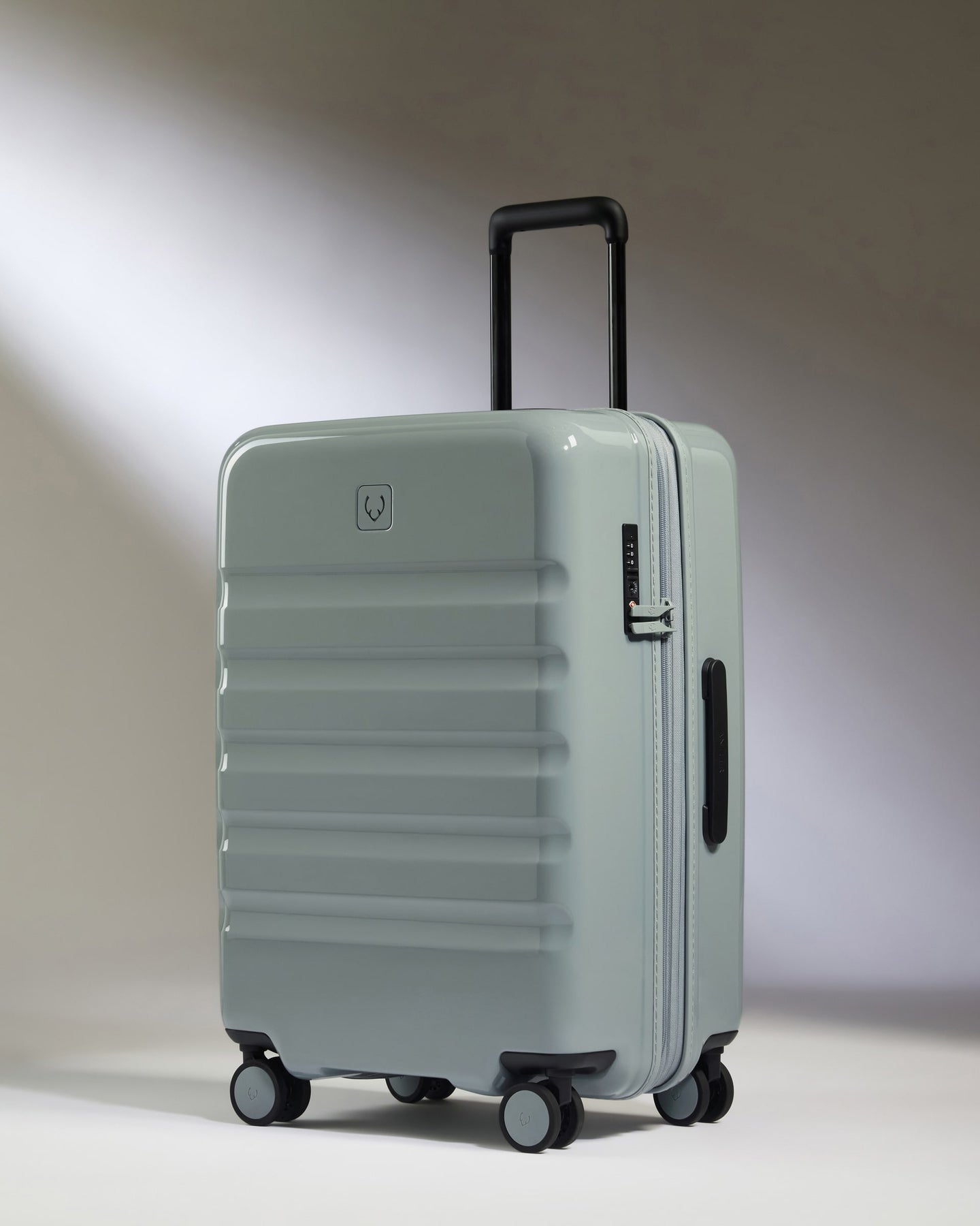 Medium Luggage in Mist Blue Gloss - Icon Stripe