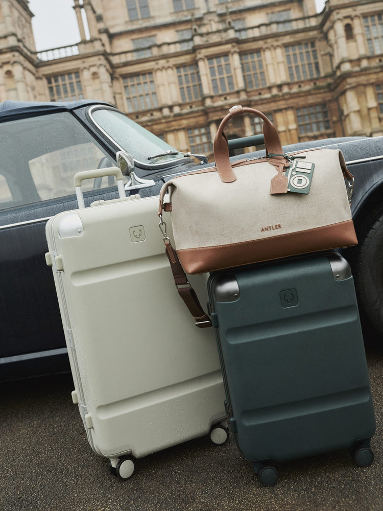 a group of luggage on a road