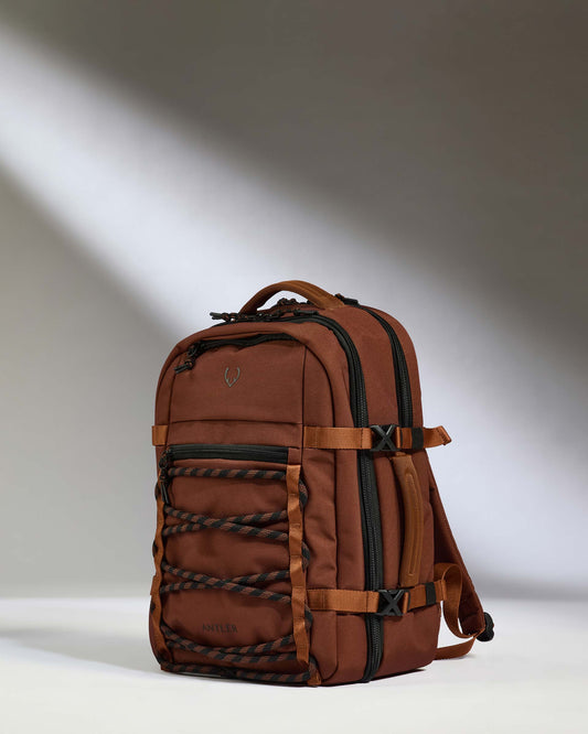 a brown backpack with black straps