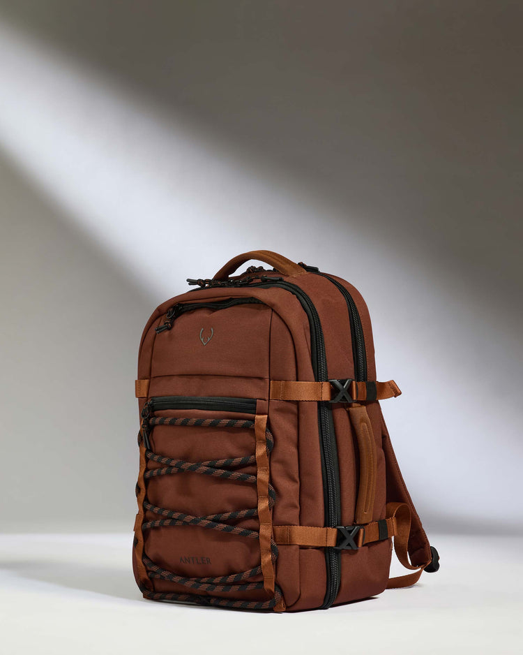 a brown backpack with black straps