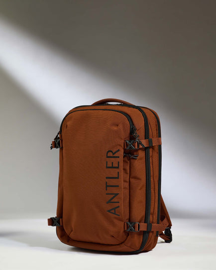 a brown backpack with black straps