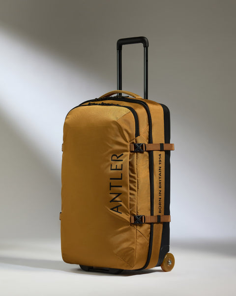 best travel duffel bag world straps wheels rolling Discovery Wheeled Duffel in Yellow