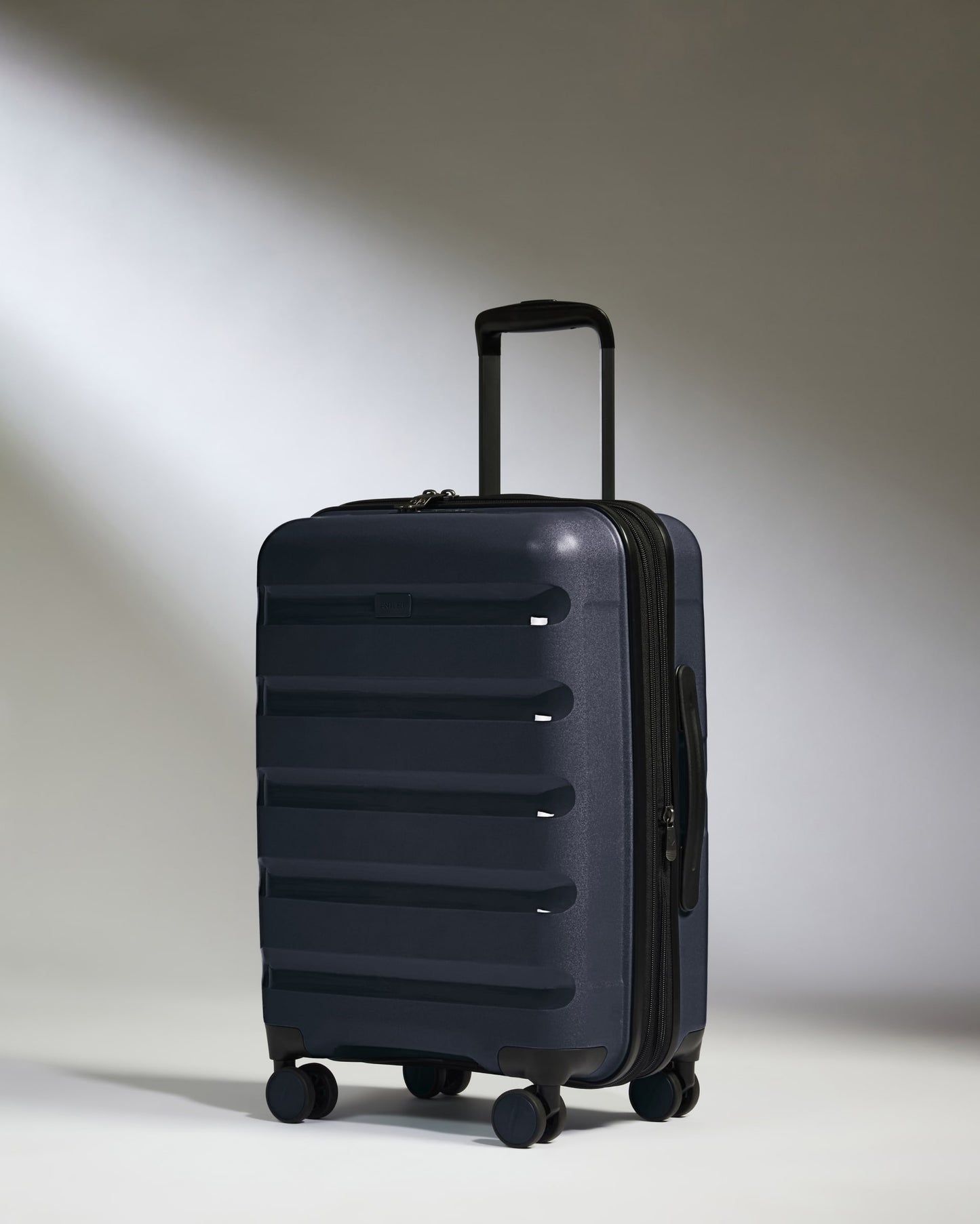 Expandable Carry-on Luggage in Navy - Logo Stripe