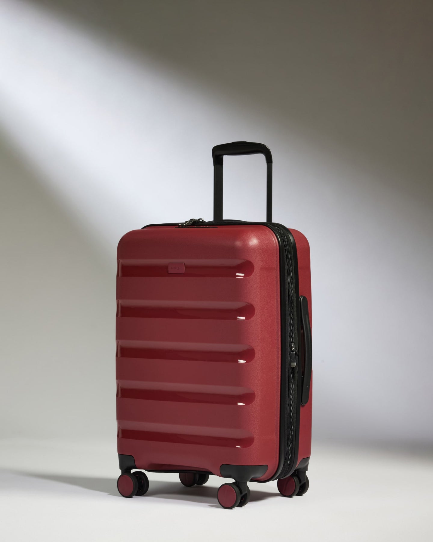 Expandable Carry-on Luggage in Soft Red - Logo Stripe