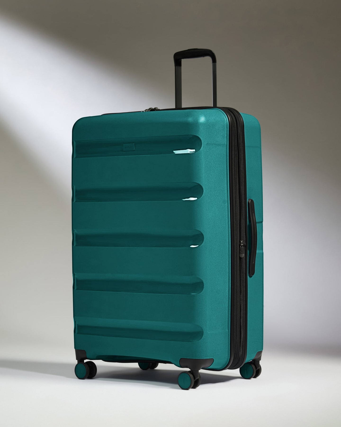 Large Luggage in Deep Teal - Logo Stripe