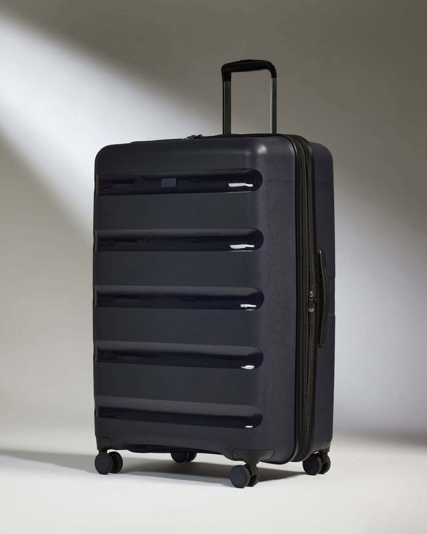 Large Luggage in Navy - Logo Stripe