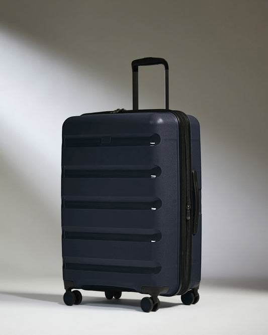 Medium Luggage in Navy - Logo Stripe