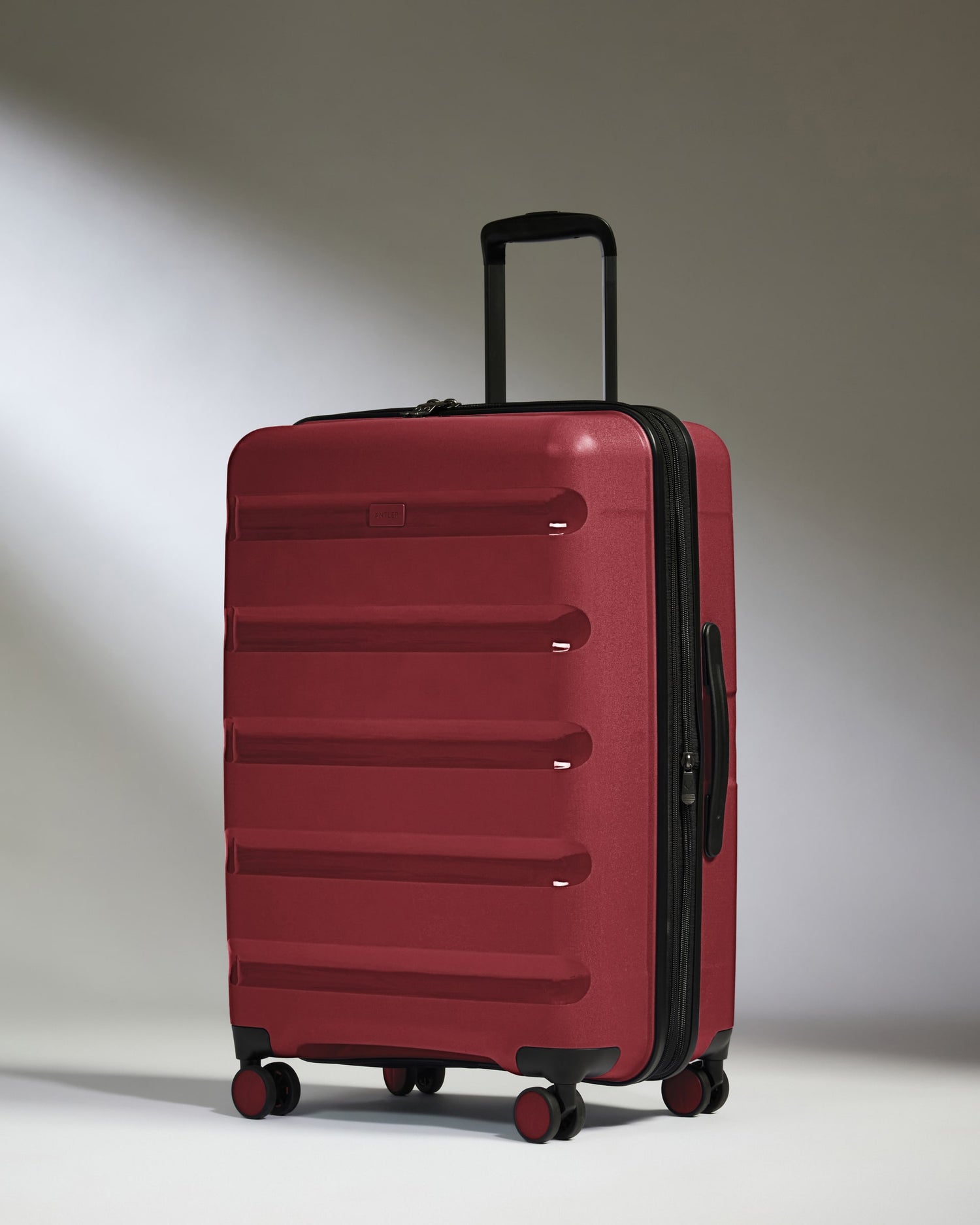 Medium Luggage in Soft Red - Logo Stripe