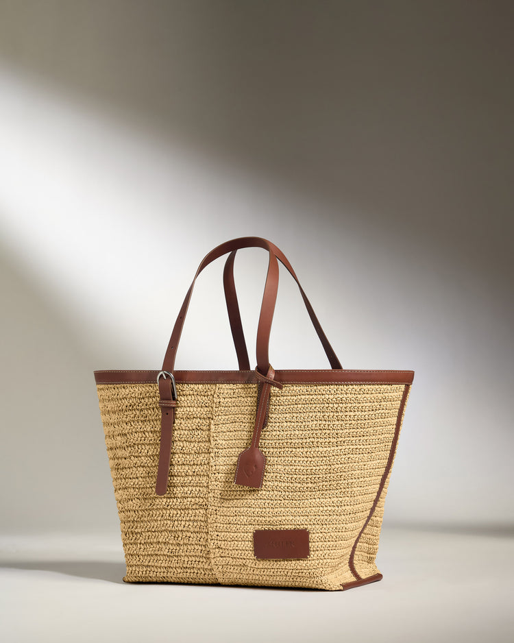 a brown and tan woven bag