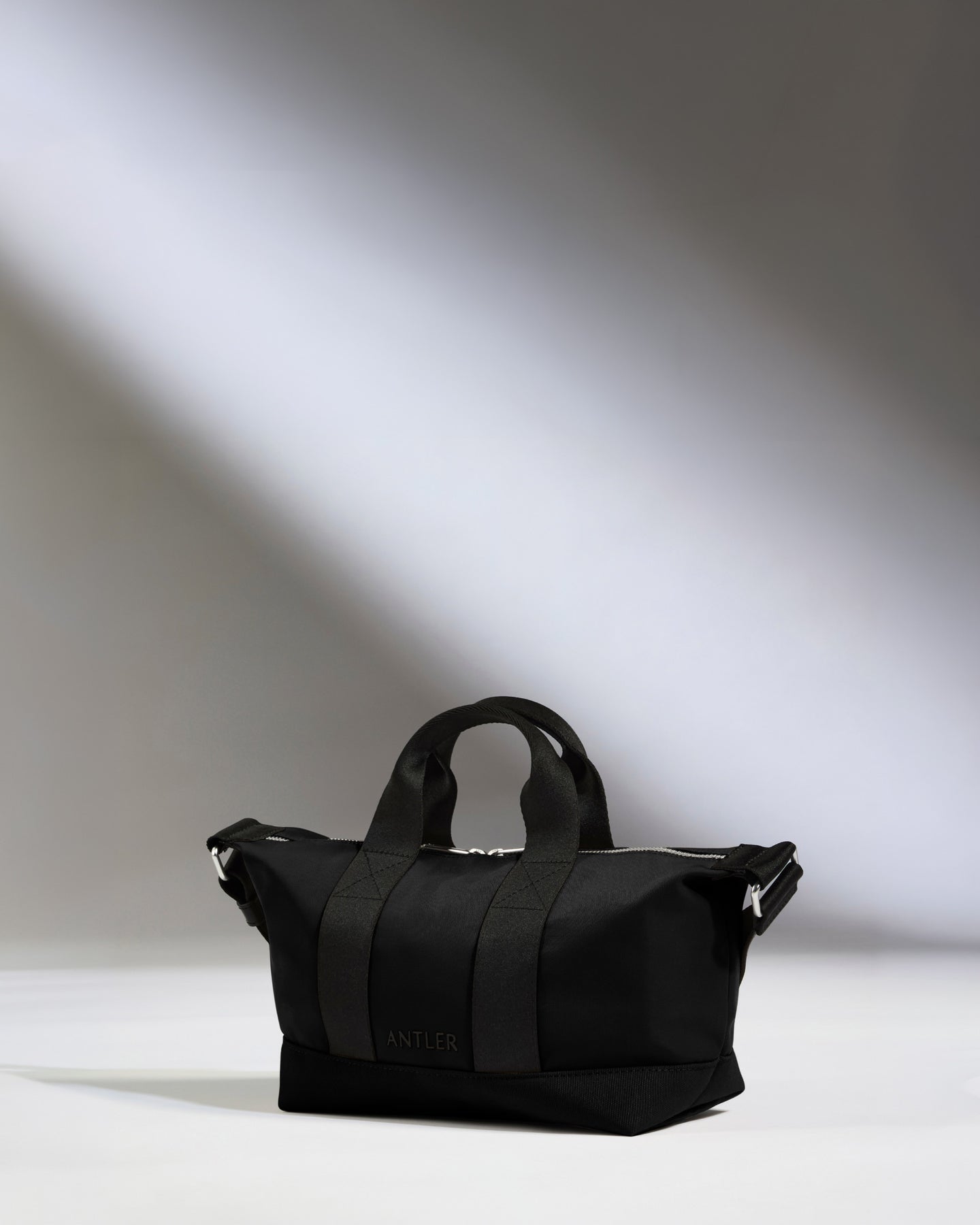 Icon Mini Crossbody Bag in Black