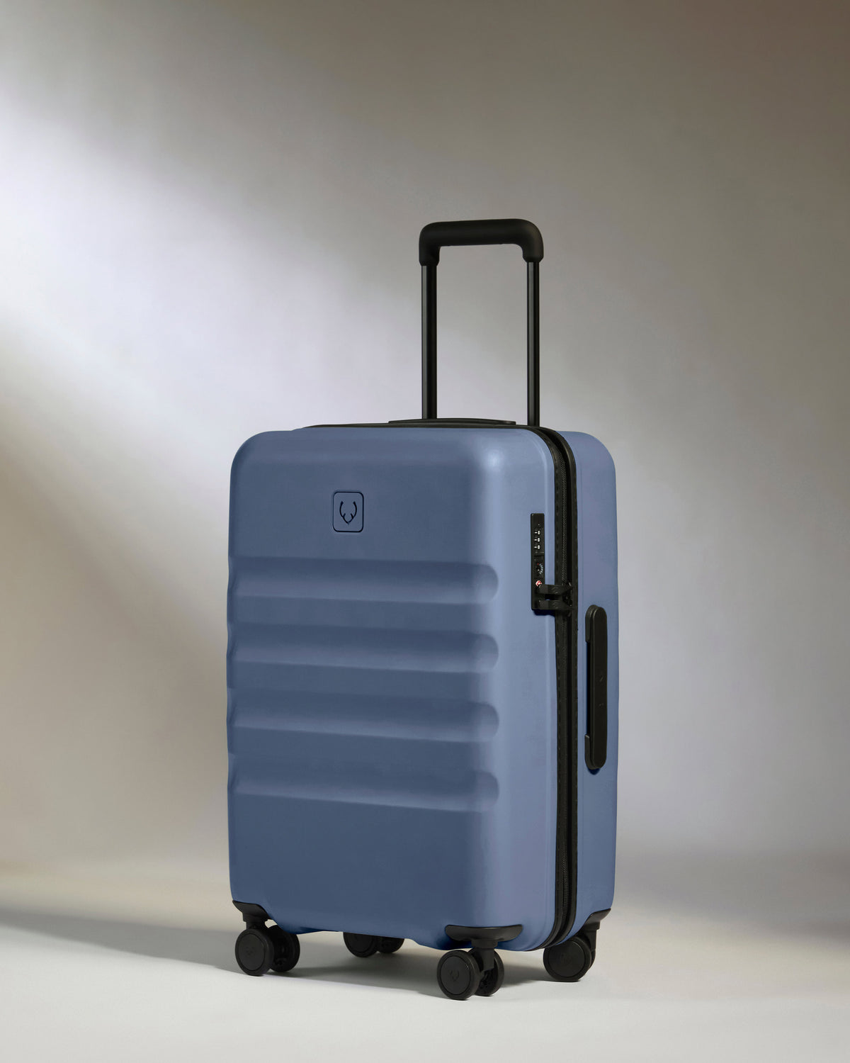 Large Carry-on Luggage in Ocean Blue - Icon Stripe