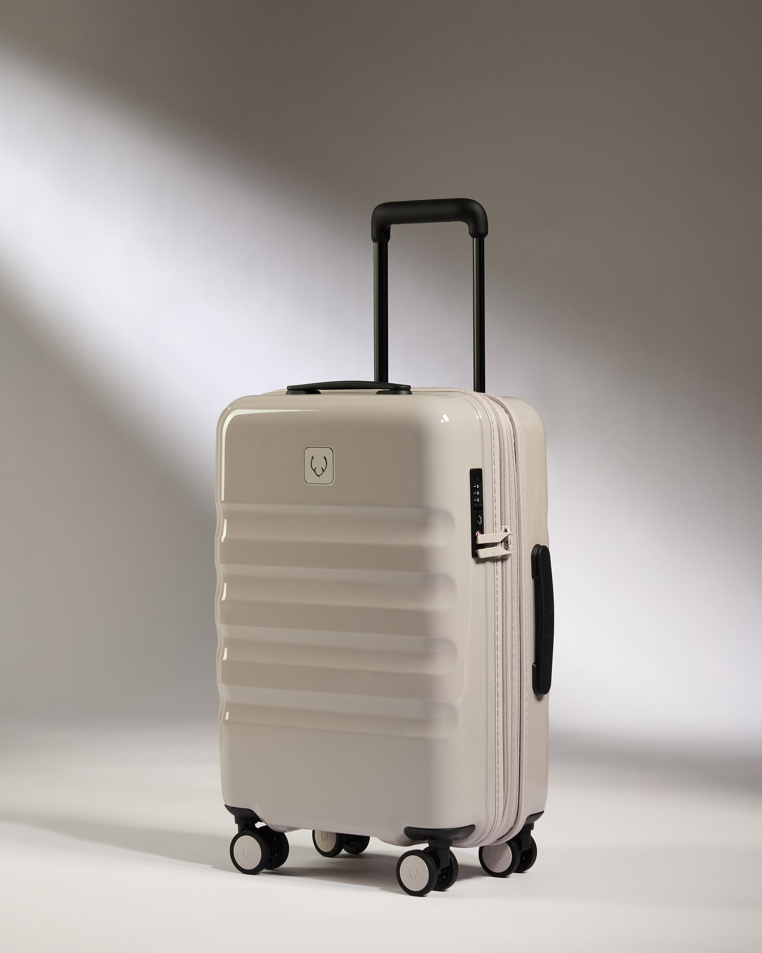 a white suitcase with wheels