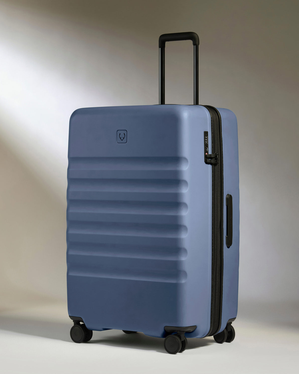 Large Luggage in Ocean Blue - Icon Stripe