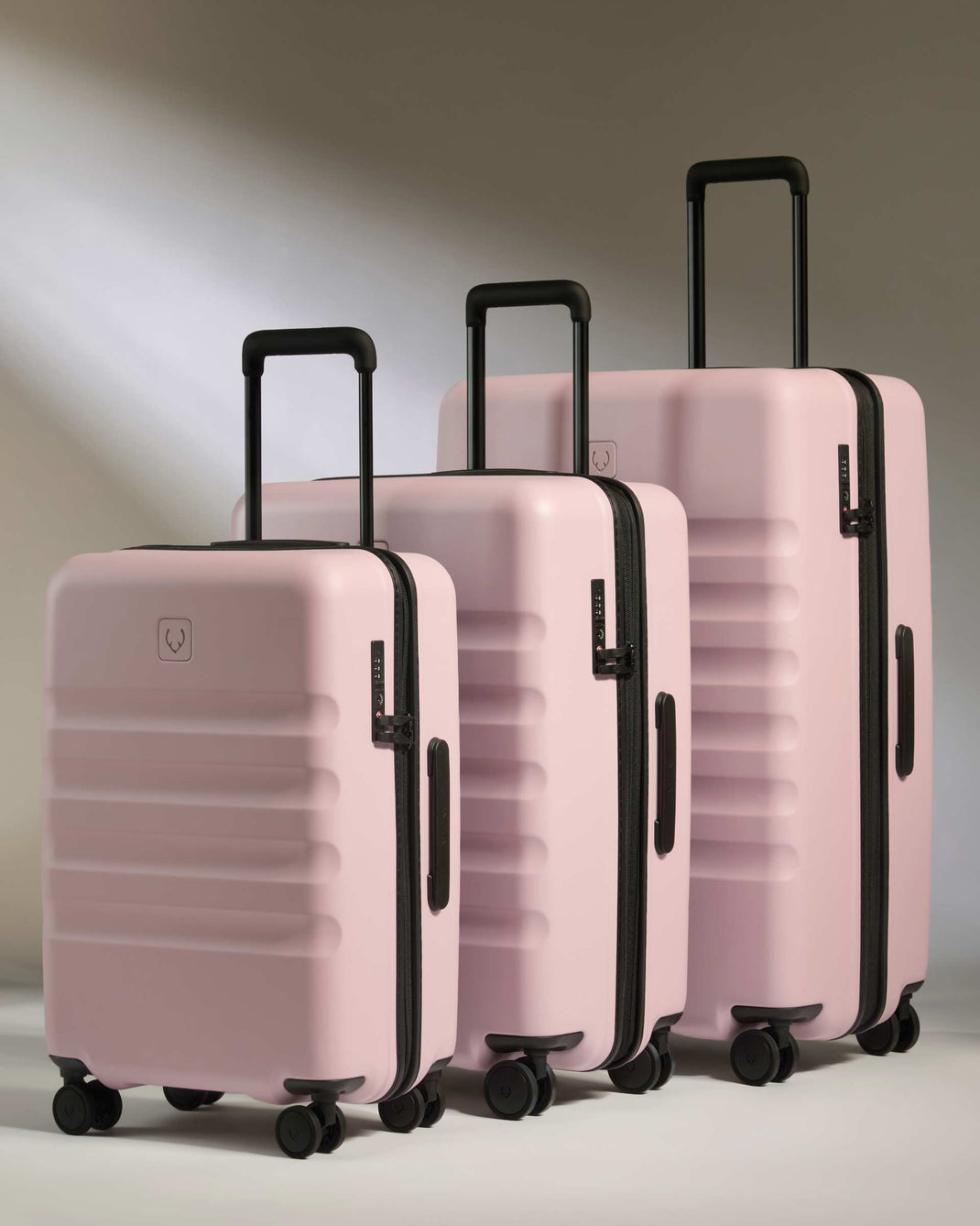 Large Suitcase in Pink - Icon Stripe | Lightweight & Hard Shell ...