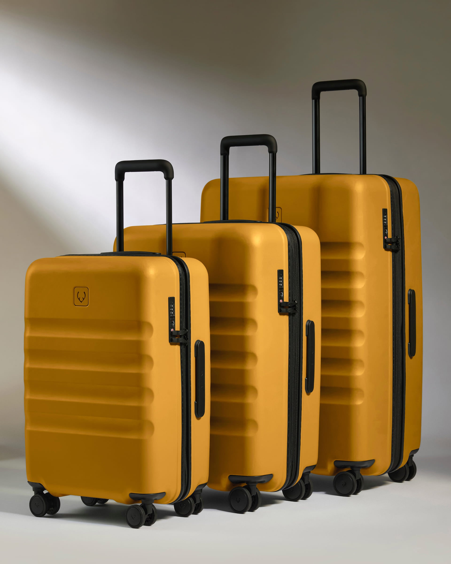 a group of yellow suitcases