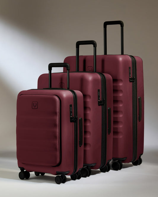 a group of luggage on wheels