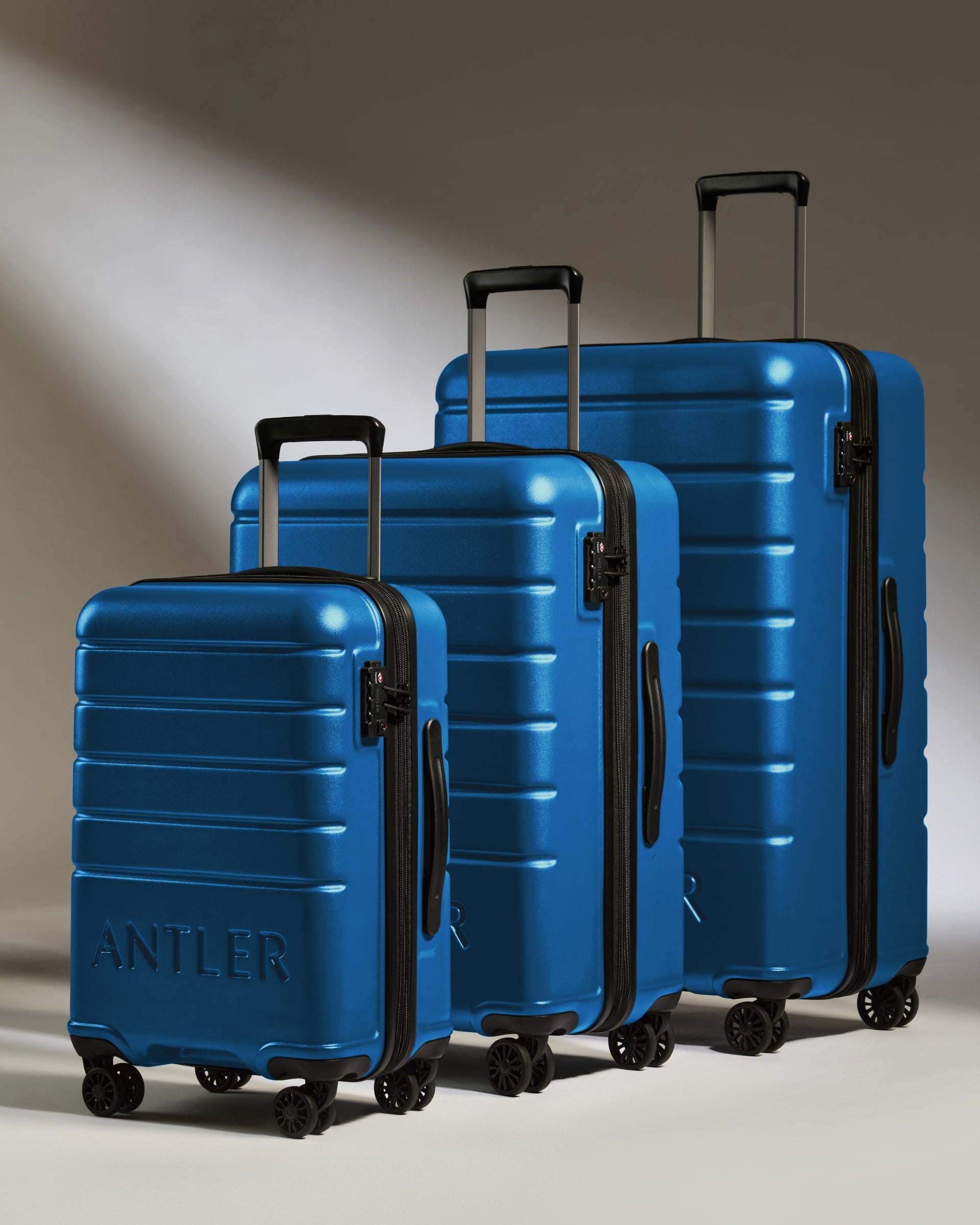 Expandable Carry-on Luggage Set in Bold Blue Logo Lightweight
