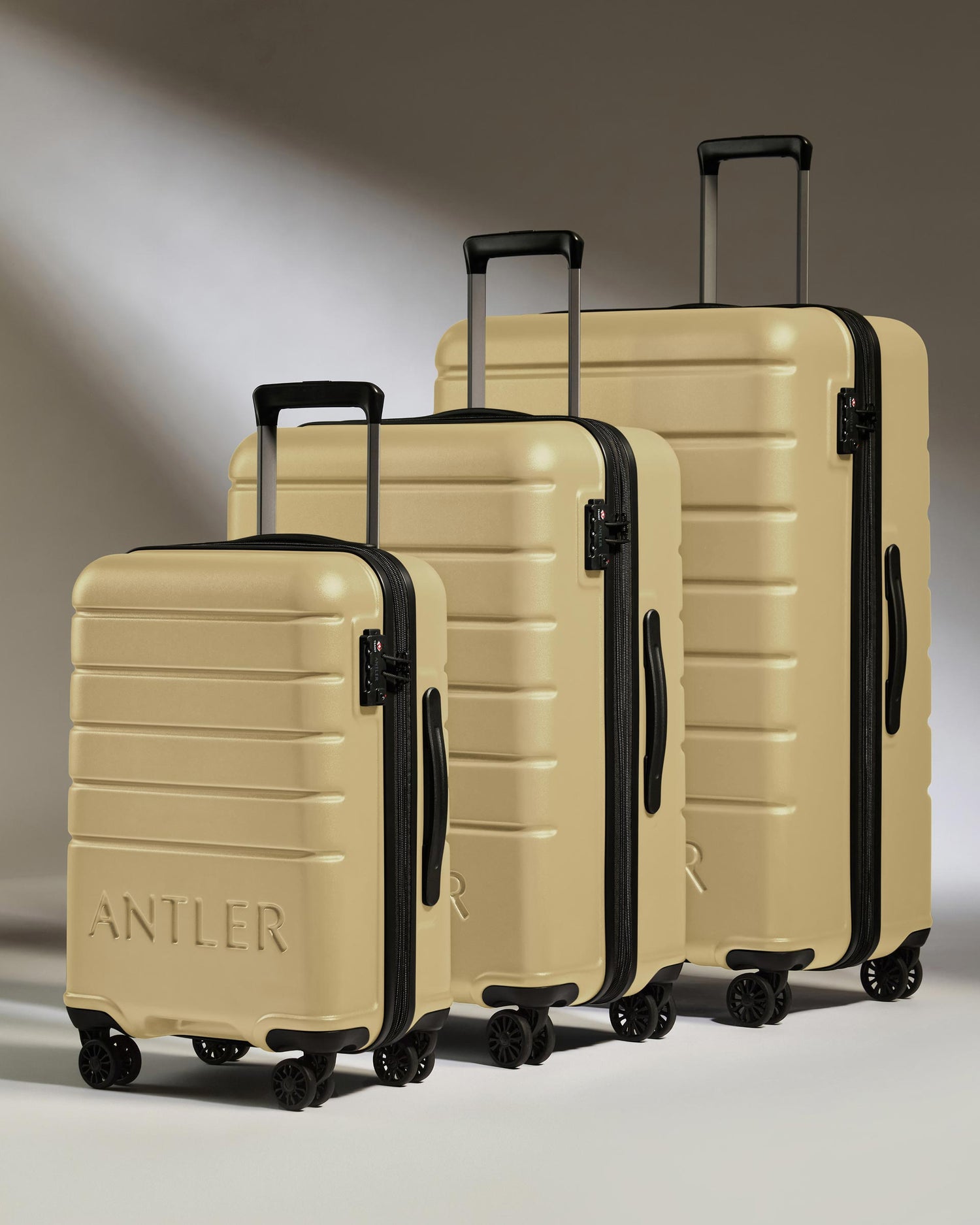 Expandable Carry-on Luggage Set in Dark Sand - Logo