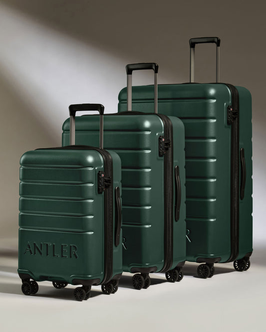 a group of luggage on wheels