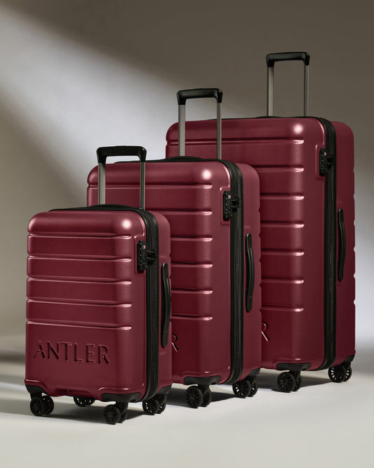 a group of luggage on wheels