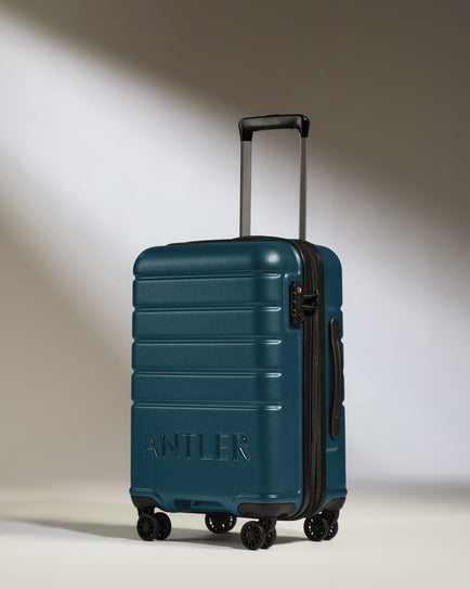 a blue suitcase with wheels